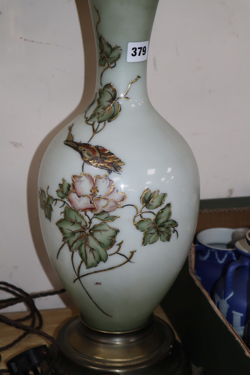 A pair of enamelled white glass table lamps, 82cm including shades